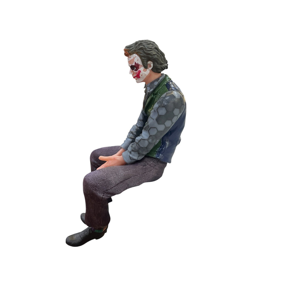 Joker Sitting Pose Action Figure – Detailed Collectible Figurine